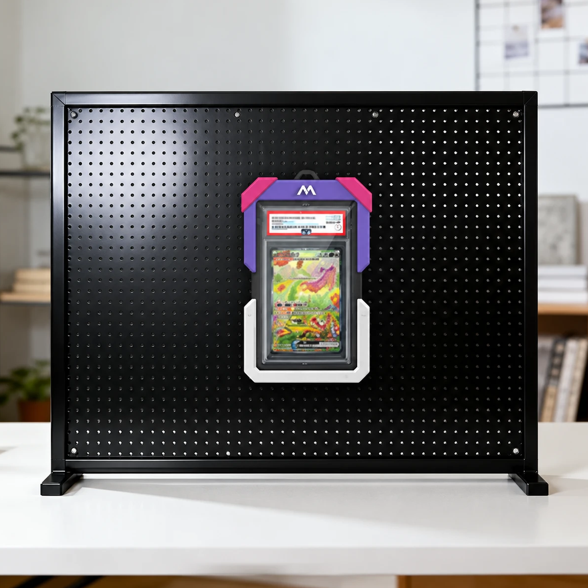 Outdoor Hard Case holding a graded card on a steel pegboard